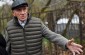 Bolesław K., born 1932, showing the Yahad team the site of several isolated shootings of Jews next to the Jewish cemetery in Bychawa. ©Piotr Malec/Yahad - In Unum