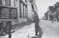 View of the Riga ghetto fence with a sign posted in German and Latvian,  1941– 1943. @USHMM WS #28041, COURTESY OF JOSEPH LEVY