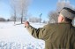 Anton P. showing the place where some Odelsk Jews were shot in the former Jewish cemetery. ©David Merlin-Dufey/Yahad - In Unum