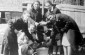 A group of girls at a well: (left to right) Sonia Strichanski, Slove Taudrese, Ronia Pergament, Chashe Mampil, unidentified, 1938. ©Taken from eilatgordinlevitan.com/postavy/postavy.html