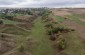 The ravine located not far away from the cemetery where from 150-300 Jews were murdered in August 1941. ©Les Kasyanov/Yahad - In Unum