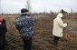 The husband of Antonina I. and Yahad members at the location of grave N°7 © Nicolas Tkatchouk – Yahad-In Unum