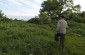 Boris T., born in 1929, leads the Yahad team to the site where two Jewish men were shot by a German after being denounced. The pits are located in the kitchen garden. ©Victoria Bahr/Yahad-In Unum