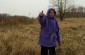 Witness Feliksa Z., born in 1928, points out the site from which she saw the shooting of 45 Jewish men, women and children who were driven to Sułów on 6 carts and killed in a meadow situated on “Grodek” hill in October 1942. ©Jethro Massey/Yahad - In Unum