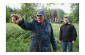 Grigori B., born in 1930, pointing out the execution site to the Yahad team.©Guillaume Ribot/Yahad – In Unum