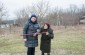 The Yahad team with Iaroslava K. at the execution site at the Jewish cemetery.  ©Les Kasyanov/Yahad - In Unum