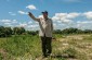 At the extermination site, the witness shows the team the mass grave. © Aleksey Kasyanov - Yahad-In Unum