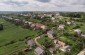 A drone view at the execution site located in the village of Velykyi Hlybochok. Back then it was the field without buildings. At this site, 2,000 POWs and 5,000 Jews were killed during the occupation. ©Les Kasyanov/Yahad - In Unum