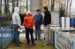 Yahad research team with the witness at the killing site. ©Aleksey Kasyanov/Yahad - In Unum