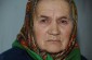 Anastasia K., nacida en 1930 fue obligada por la Comisión Estatal Soviética a abrir la fosa y exhumar los cuerpos”. ©Nicolas Tkatchouk/Yahad – In Unum